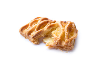 close up of crispy pineapple pie isolated on white background