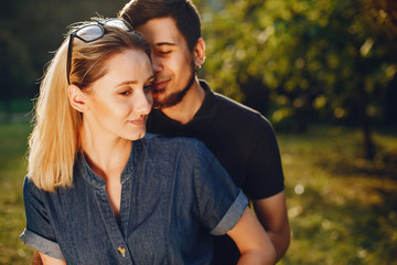 Fototapeta premium happy young couple in the park