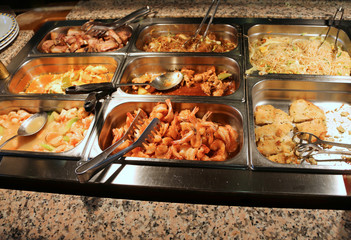 foods in the tray of an all-you-can-eat self-service restaurant