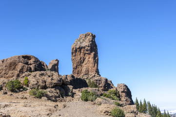 Fototapeta na wymiar Views of Roque Nublo peak (Clouded rock), in Nublo Rural Park, in the interior of the Gran Canaria Island, Canary Islands, Spain