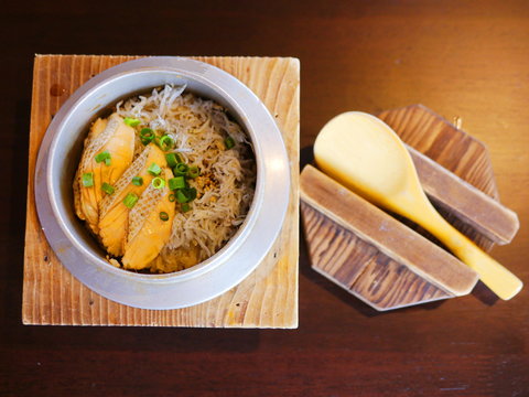 Shirasu (small white fish) and salmons cooked in a steel kettle