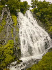 Oshinkoshin waterfall in forest, Shiretoko peninsula, Hokkaido, Japan