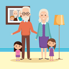 Obraz premium grandparents with granddaughters in house