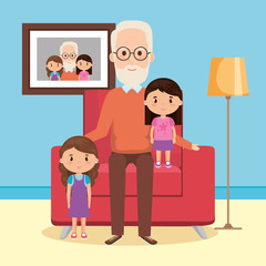 grandfather with granddaughters on livingroom