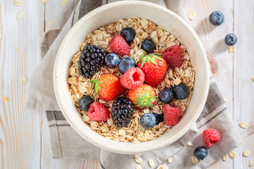 Tasty oat flakes with berry fruits for breakfast