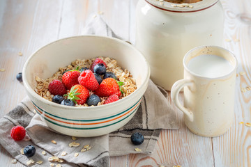 Tasty granola with fresh fruits for breakfast