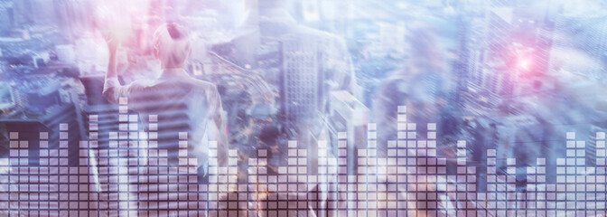Financial chart on blurred skyscraper office background.