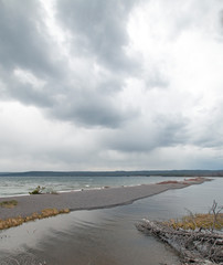 Narrow thin peninsula of sand called Hard Road to Follow on the banks of Yellowstone Lake in Yellowstone National Park in Wyoming United States