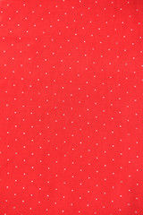 Background of red fabric with white polka dots background