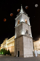 Bell Tower of the Church of Santa Sofia in the Night of Benevento (Italy) with total eclipse of moon