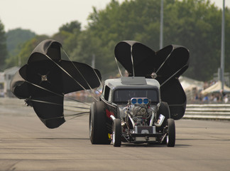 Dragster Deploys Chutes after Racing Run at the Drag Strip