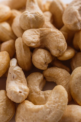 cashew nuts on a white acrylic background