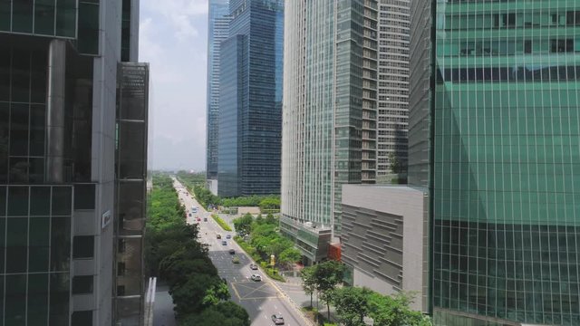 Financial and business centers in asian. Shot. Top View of Skyscrapers in a Big City with development buildings, transportation, energy power infrastructure