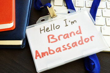 Brand ambassador badge on a keyboard. - obrazy, fototapety, plakaty