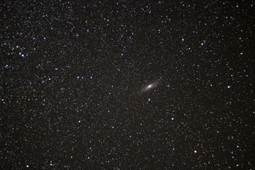 Andromeda galaxy with starry sky