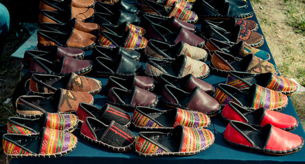 Set of traditional hand made leather shoes in bazaar