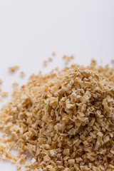 fragrant dried parsnip on a white acrylic background