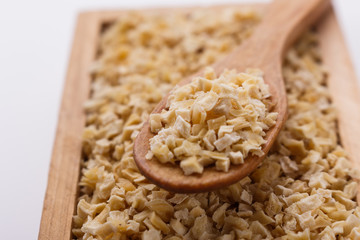 fragrant dried parsnip on a white acrylic background