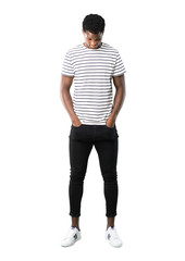 Full body of Dark skinned man with striped shirt standing and looking down on white background