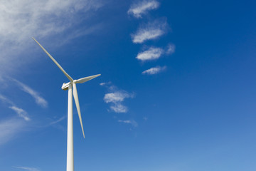 Background - wind turbine under blue sky