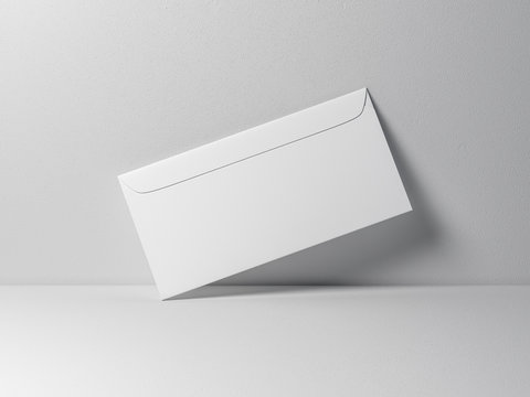 White Envelope Mockup On Gray Background