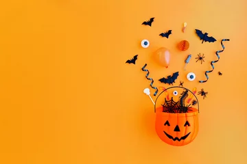 Foto auf Glas Pumpkin with Halloween objects © Ruth Black