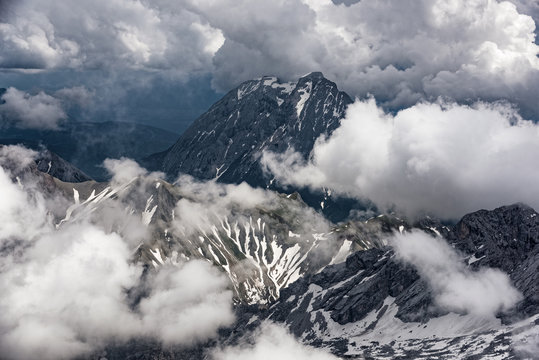 Panoramic view to the Bavarian Alps from Zugspitze, the highest mountain in the country and home to three glaciers and Germany's highest ski resort.