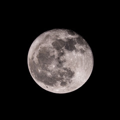 Full moon in the night on black background