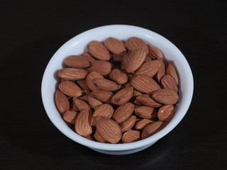 Almond isolated. Nuts on white background, Amonds, Badam ,Almond. Almond nut isolated. Almond slice. Full depth of field