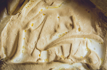 Close up view of weeping meringue lemon pie. Problem with too much moisture in cake.