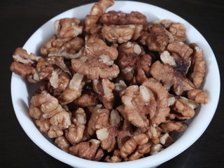Dry fruits , walnuts akhrot against white background,Walnuts - Walnuts in black background, Walnuts On White Background, Akhrot in White Bowl on Wooden Background,