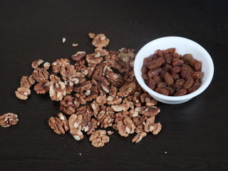Akhrot, Almonds on Wooden Background, Almonds,Akhrot on Wooden background,Kismish in White Bowl,Raisns
