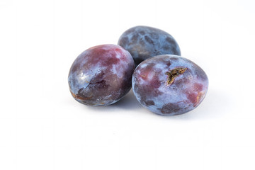 three bad plum on the white background