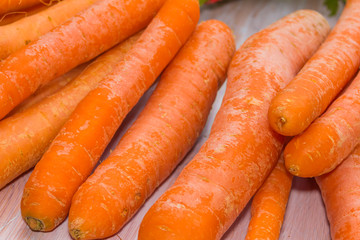 Fresh, raw, organic, bio, orange carrots. Healthy vegan vegetarian vegetable food 