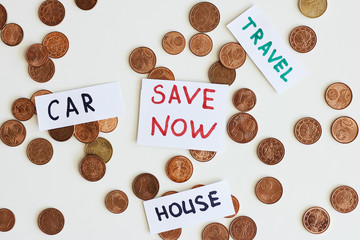 Saving money for the best life concept. Coins and signs travel, car, house, save now
