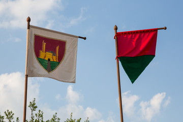 Flags in the historic hilltop town of Monteriggioni