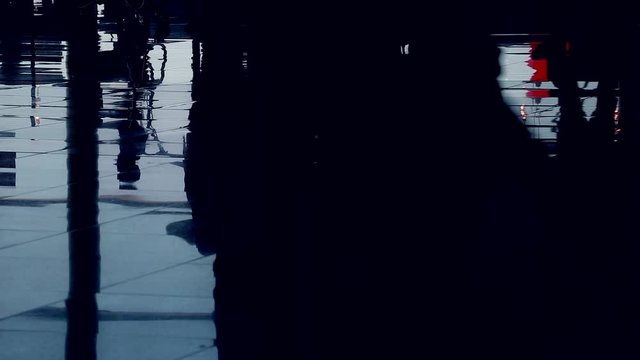 Timelapse Shadows Of People Walking Or Waiting In The Airport Terminal, Reflections Of Travelers On The Tiled Floor - HD Video