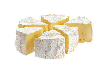 Camembert cheese segments isolated on white background