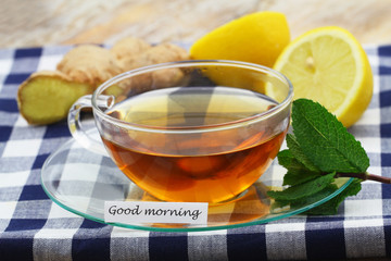 Good morning card with cup of tea, fresh mint, lemon and ginger
