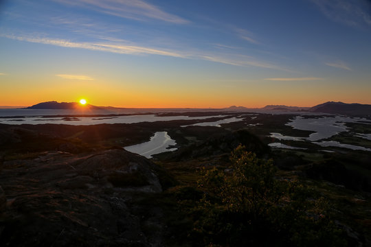 Happy walking and sunset at Mountain Tilremshatten in Northern Norway