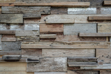 The texture of the wooden wall.