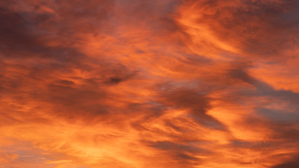 Dramatic Sunset red Clouds in the nature