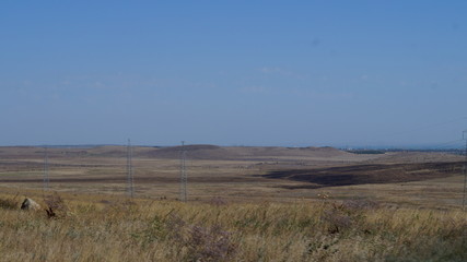 Fototapeta na wymiar view of desert landscape with blue sky