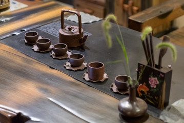 Chinese green tea service on a wooden table