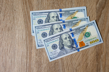 Obraz premium Concept of Dollar Dollars Closeup Concept One hundred dollar bills Lined up Payable taxes are legal.