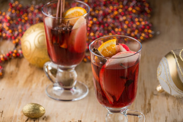 Mulled wine with nuts and spices. Selective focus.