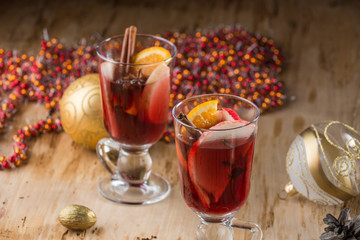 Mulled wine with nuts and spices. Selective focus.