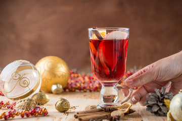 Mulled wine with nuts and spices. Selective focus.