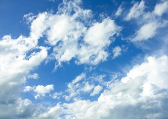 blue sky with white clouds background.