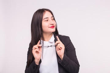 Naklejka premium Young asian student or business lady with glasses on white background